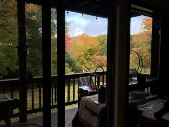 Large living room with private deck. Large living room with private deck.